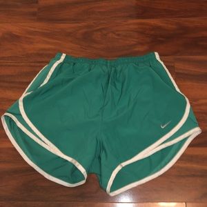 Green Nike Dri-Fit shorts